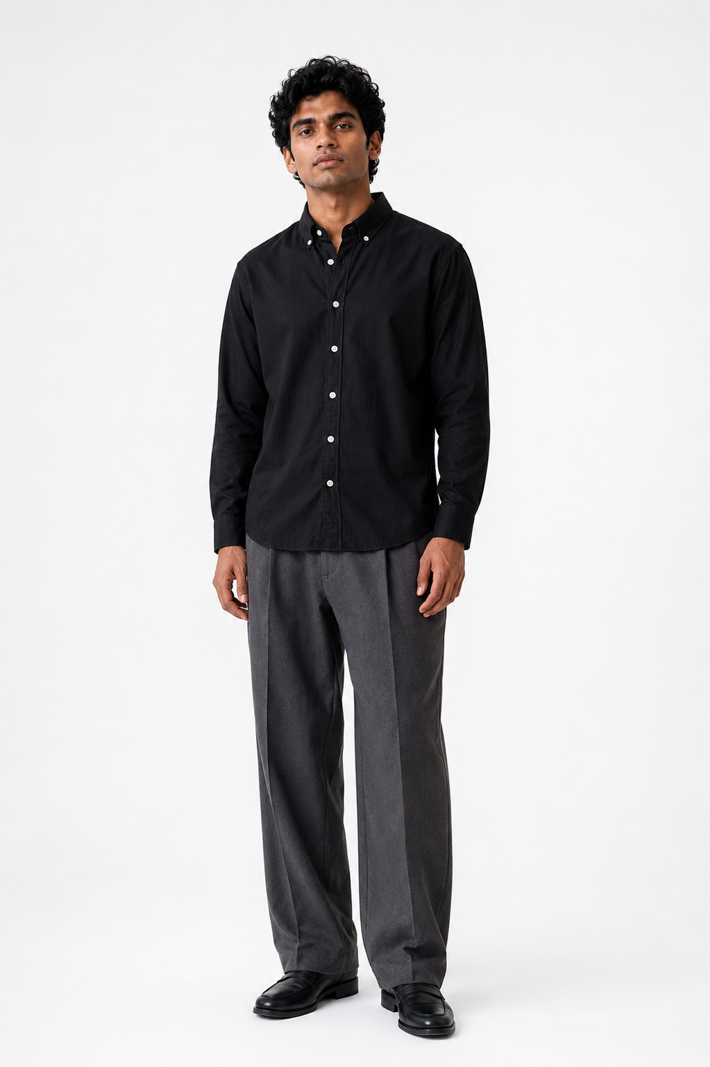 Cauzeway solid black Oxford cotton casual shirt in signature Indian regular fit, front view.