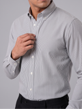 Model wearing Cauzeway charcoal grey pencil stripe shirt with button-down collar, close view.