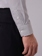Close up of the tailored cuff and pencil stripe pattern on Cauzeway charcoal grey Cotton Tencel shirt.