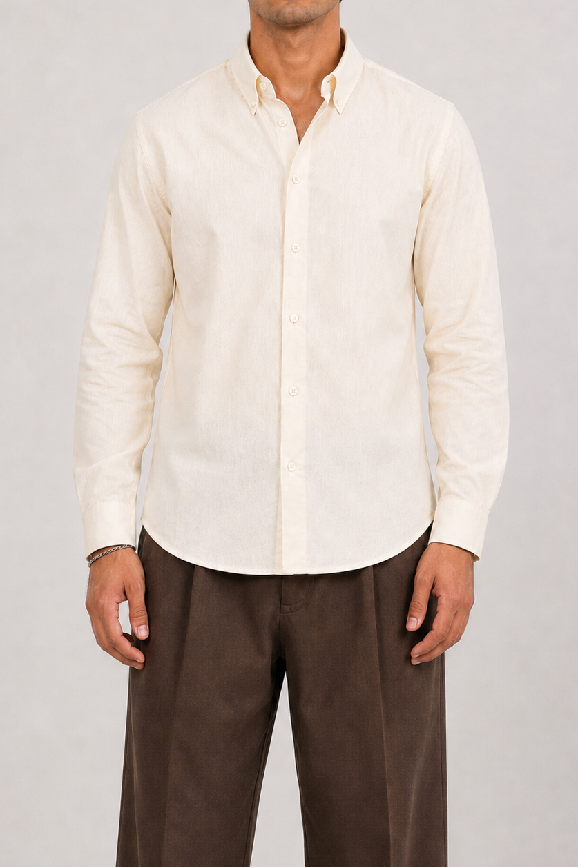 Model wearing Cauzeway off-white cotton shirt with button-down collar, front view