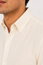 Close up of the button-down collar and soft cotton weave on Cauzeway heritage off-white shirt