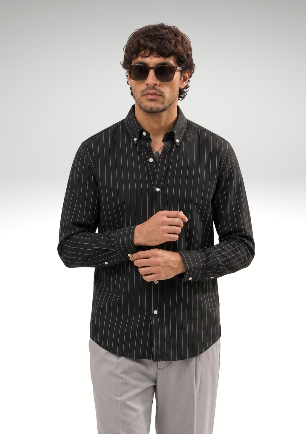 Cauzeway black pinstripe long sleeve casual shirt in signature Indian regular fit, premium cotton TFO oxford weave front view.