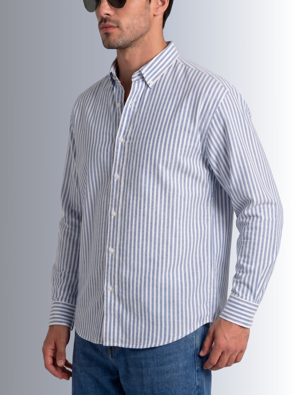 Cauzeway blue and white university stripe long sleeve casual shirt in signature Indian regular fit, premium cotton TFO oxford weave side view.